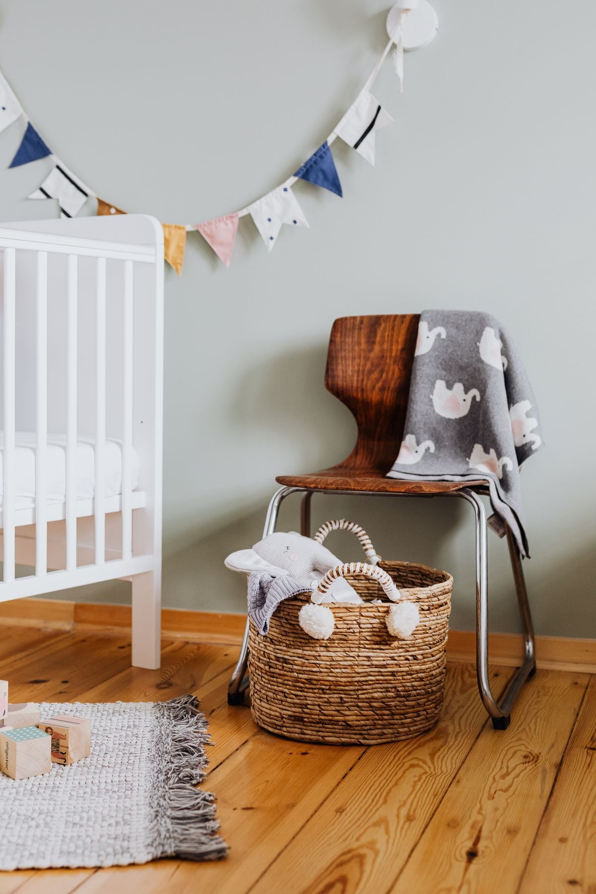 Best baby registry supplies including a bassinet and swaddles in a nursery