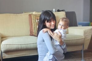 Parents choosing a newborn care professional at home