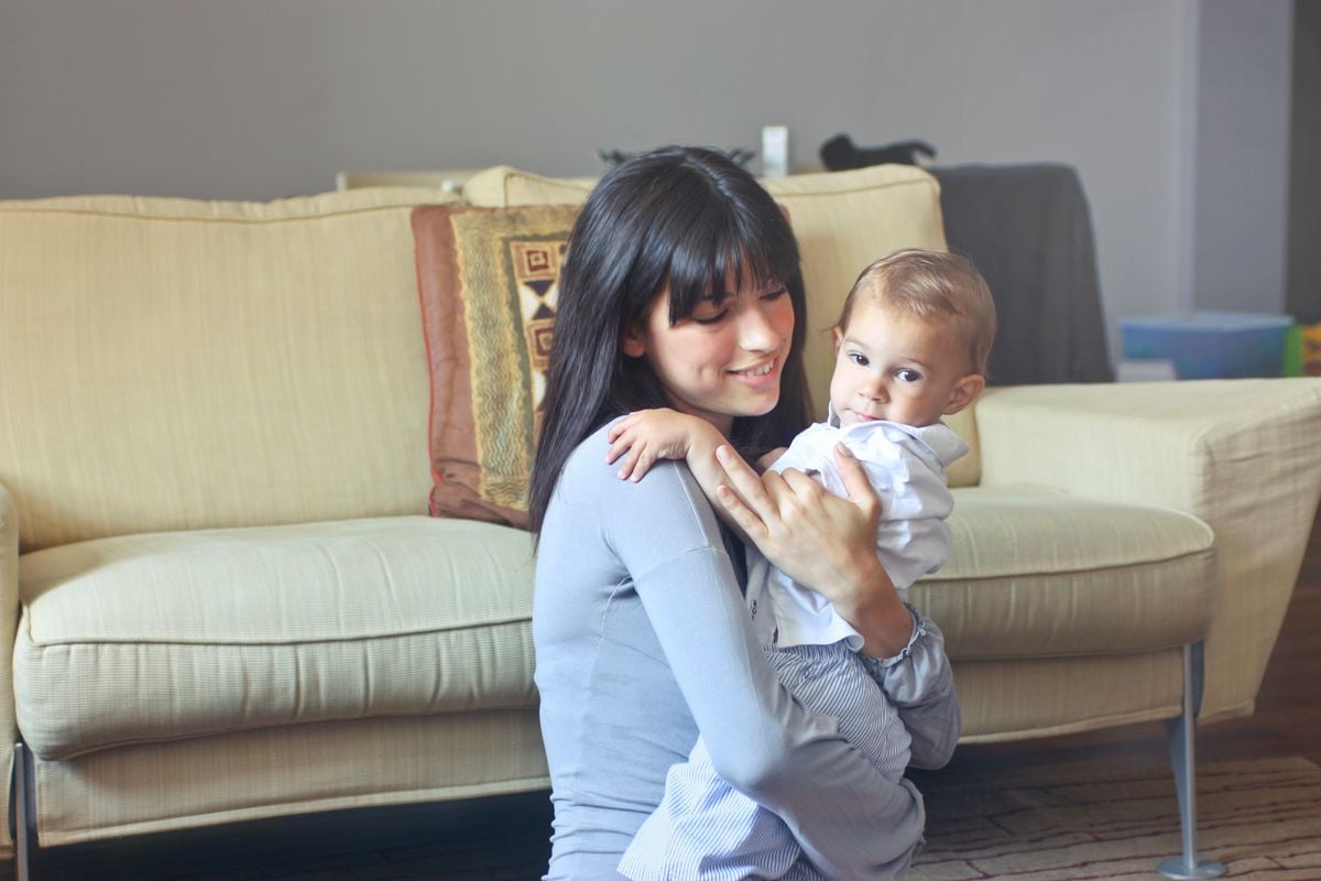 Parents choosing a newborn care professional at home