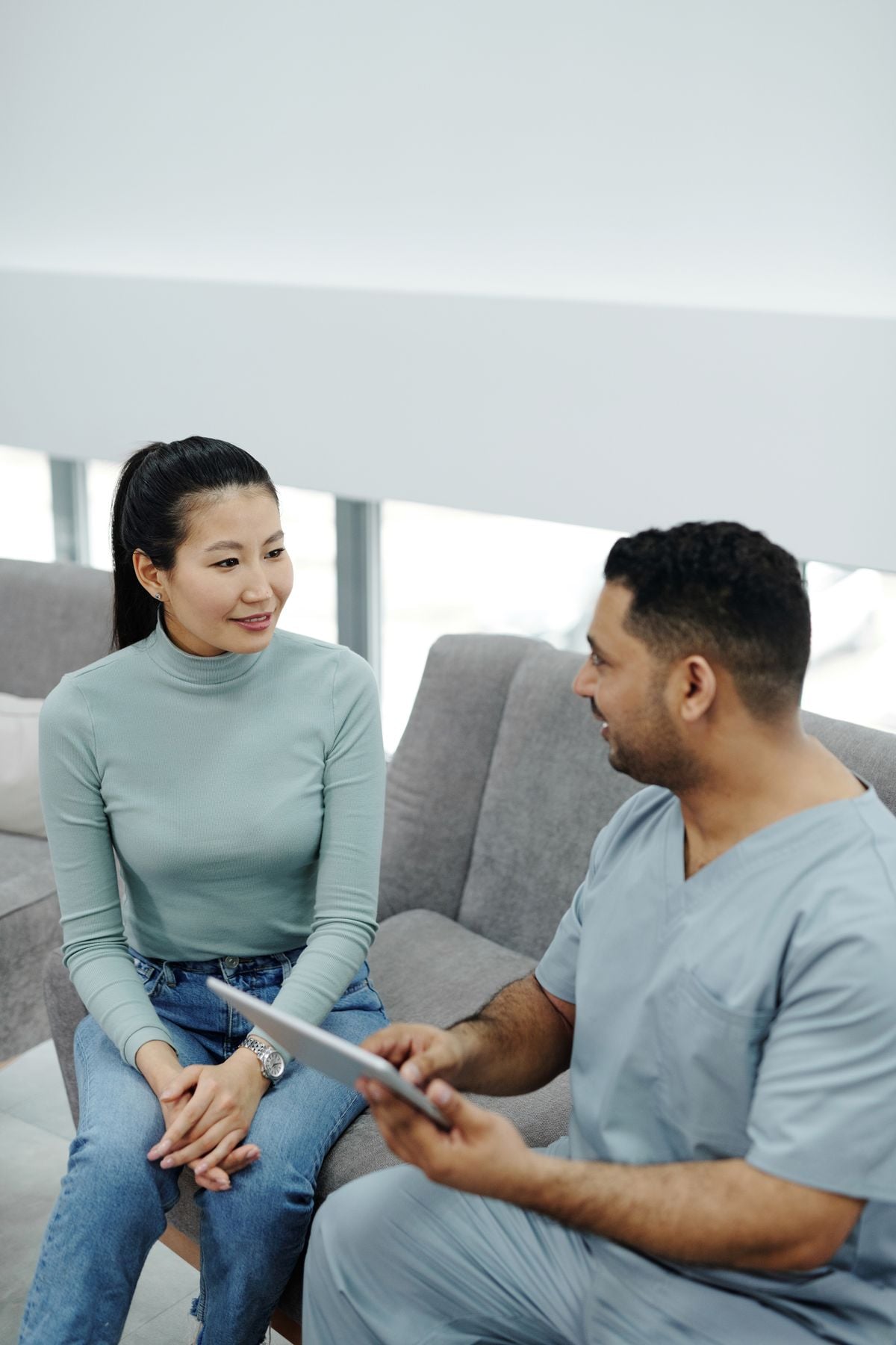New mother talking to her doctor about postpartum depression